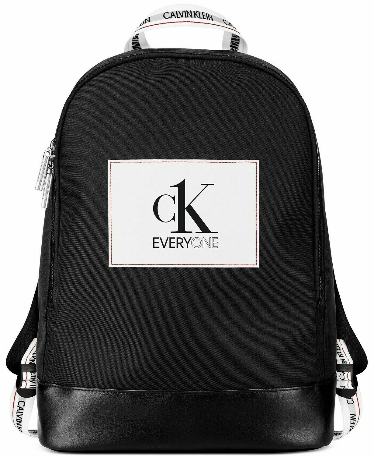 calvin klein backpack purse leather Women's Elaine Signature Key Item Flap Backpack, Brown/Khaki/Luggage Saffiano, One Size : Clothing, Shoes & Jewelry this backpack is crafted from a durable faux leather Calvin Klein CK Everyone Black